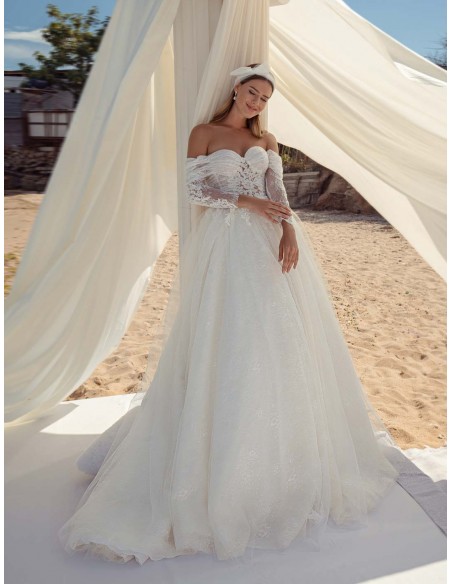 Princess cut wedding dress with wrap-around neckline and long sleeves in delicate lace by ANNIE VICTOR