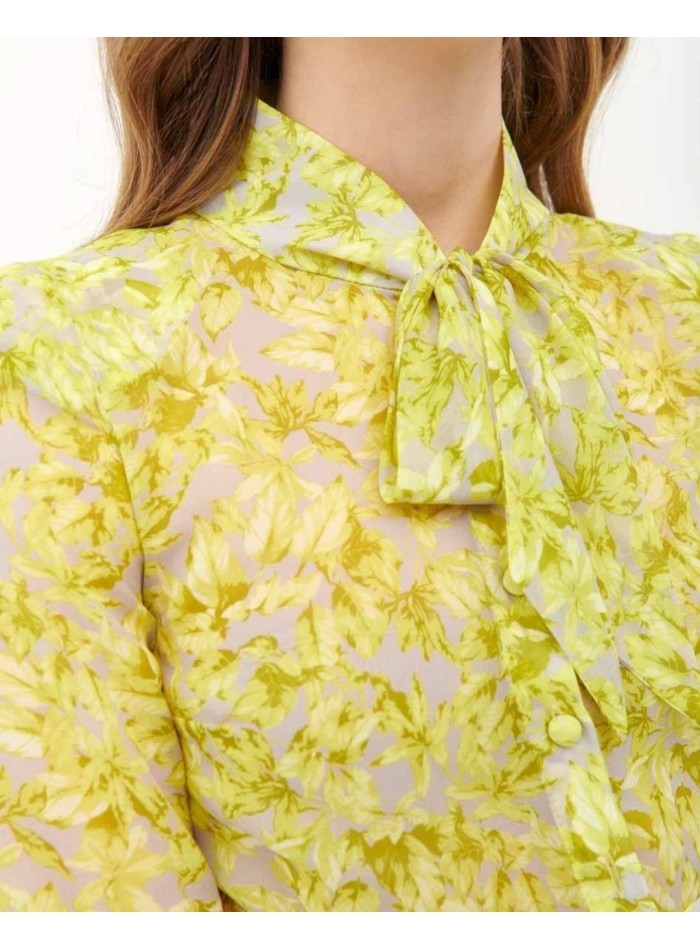 Vestido de cóctel en gasa verde pistacho y lazo al cuello de Cyrana Furs