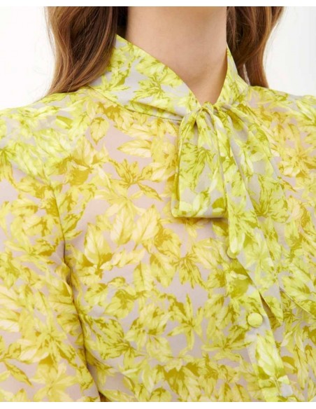 Vestido de cóctel en gasa verde pistacho y lazo al cuello de Cyrana Furs