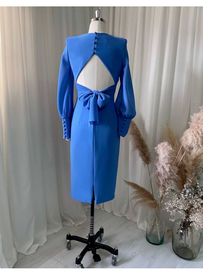 Yellow cocktail dress with long chiffon sleeves and an open back for guests