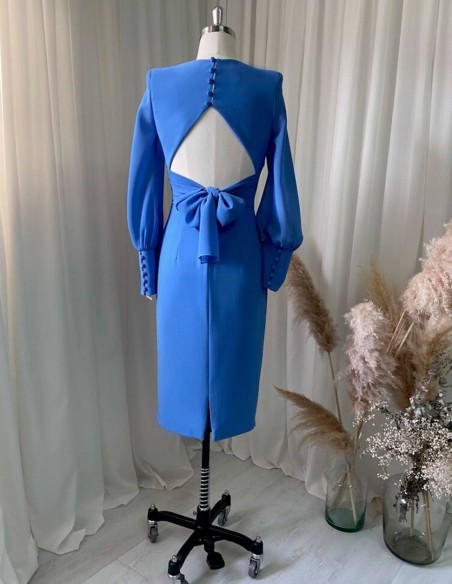 Yellow cocktail dress with long chiffon sleeves and an open back for guests