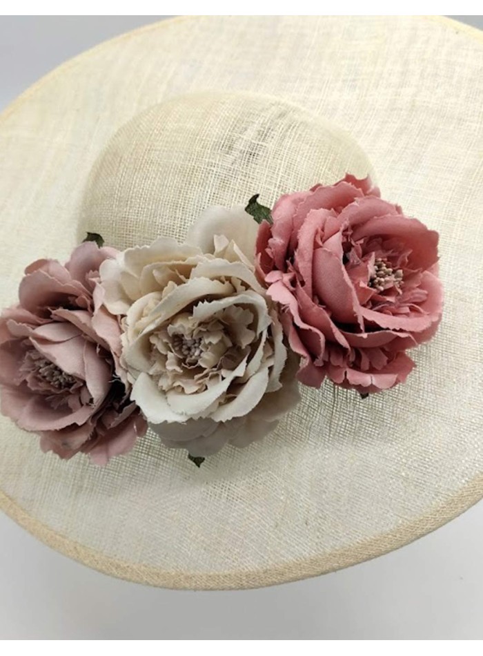 Pamela on sinamay base with pastel coloured flowers by Monisima de la muerte