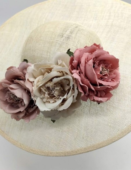 Pamela on sinamay base with pastel coloured flowers by Monisima de la muerte