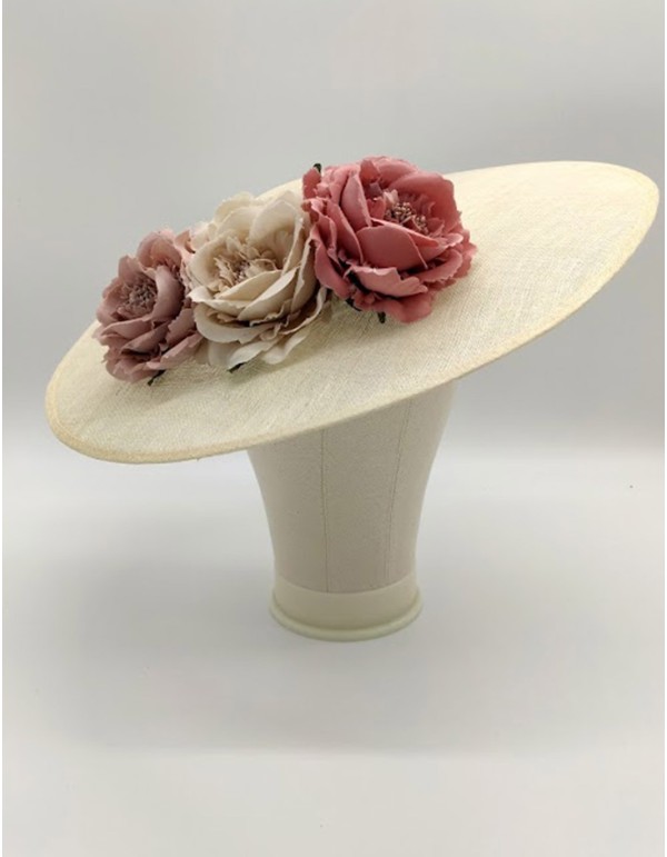 Pamela on sinamay base with pastel coloured flowers