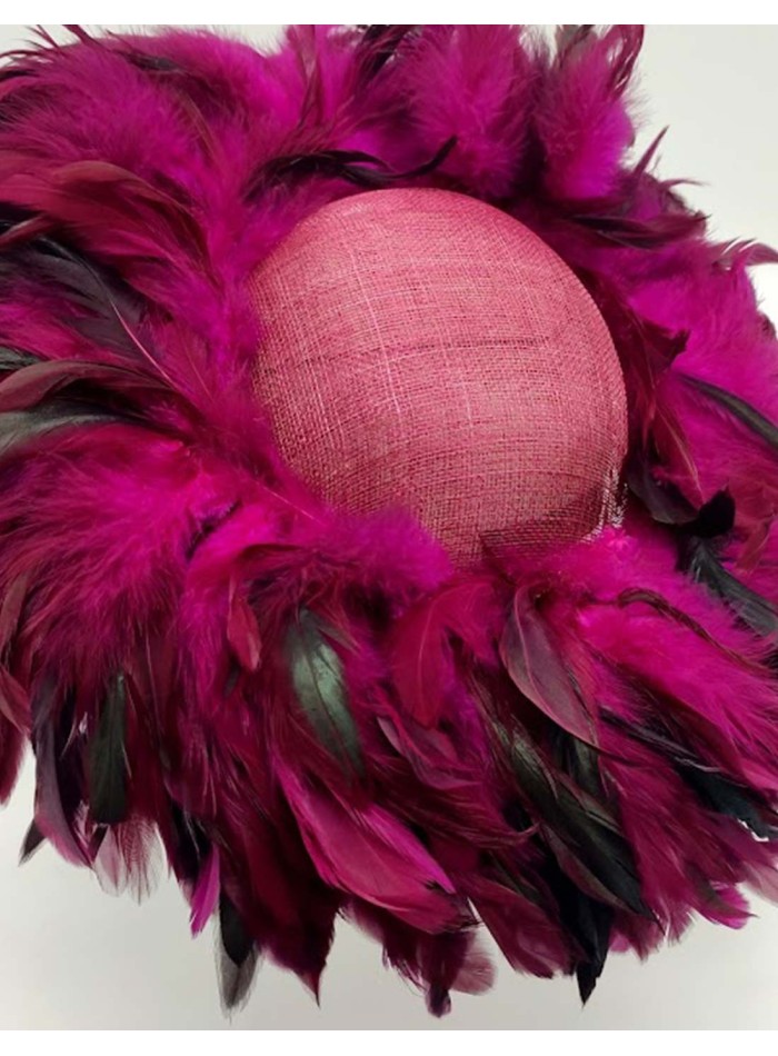 Pamela covered with pheasant feathers in bougainvillea colour by Monisima de la Muerte