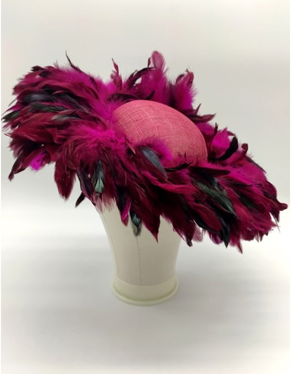 Pamela covered with pheasant feathers in bougainvillea colour