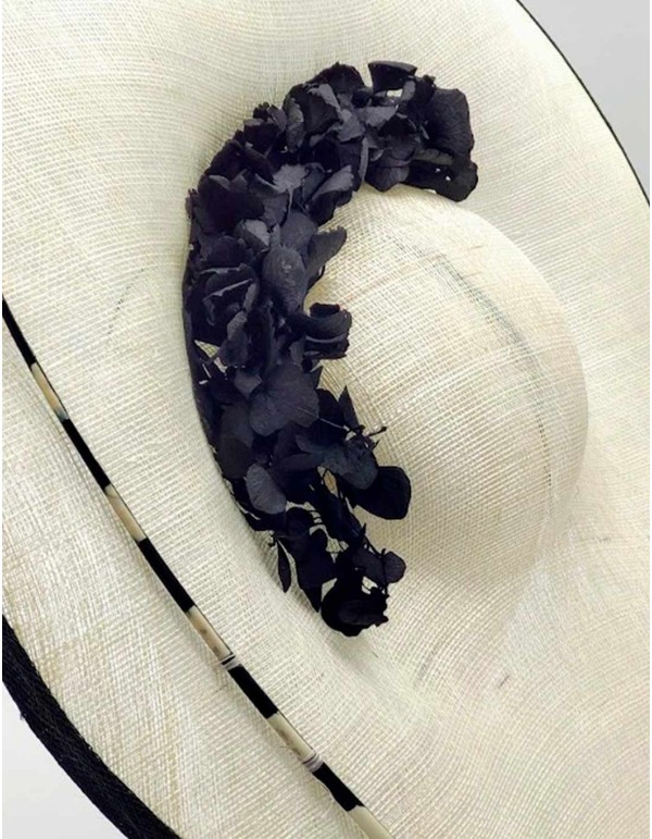 Headdress with a sinamay base decorated with preserved hydrangea branches. 2