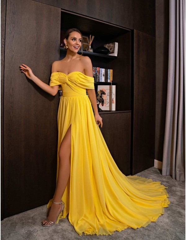 Long dress with boat neckline and drop sleeves