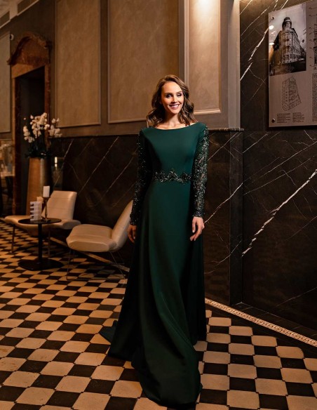 Long party dress with long sleeves and rhinestones in green colour by Silviamo