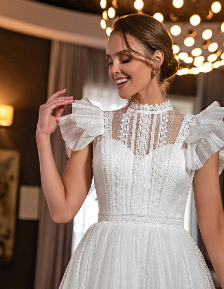 Vestido midi con falda de tul y mangas fantasía