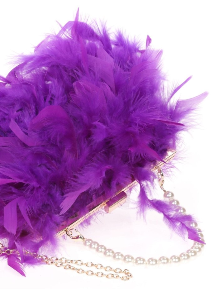 Bolso de fiesta con plumas y asa de perlas...