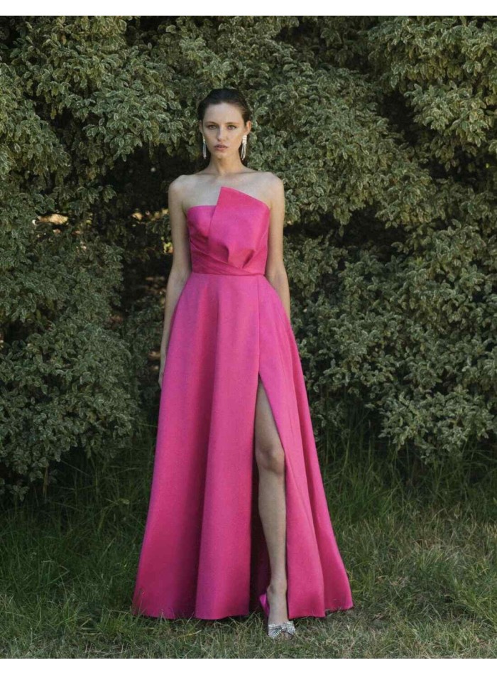 Long party dress with asymmetrical neckline and voluminous skirt