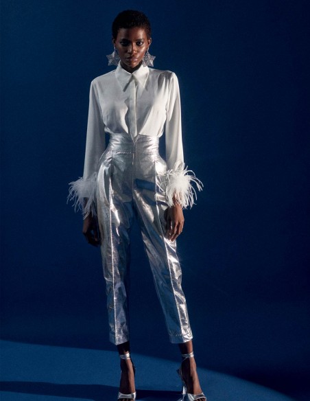 Party shirt with feathers and jewelled button