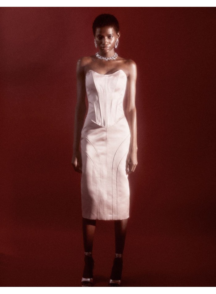 Top de fiesta rosa empolvado con corpiño corazón