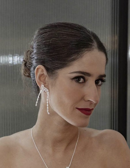 Long party earrings with silver plated crystals in the shape of an arch