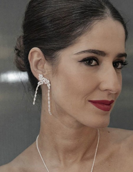 Long party earrings with silver plated crystals in the shape of an arch