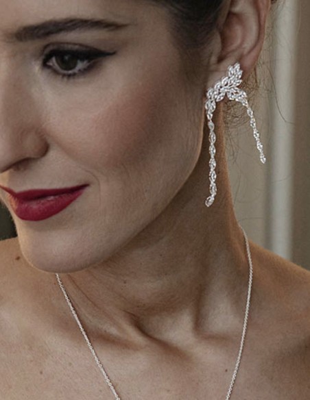 Long party earrings with silver plated crystals in the shape of an arch