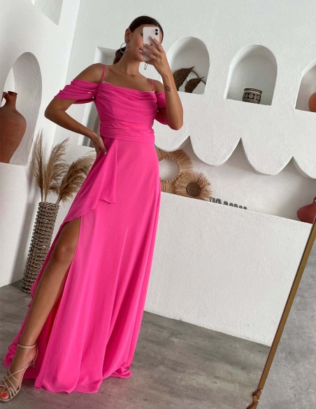 Long flowing evening dress with beaded neckline detail