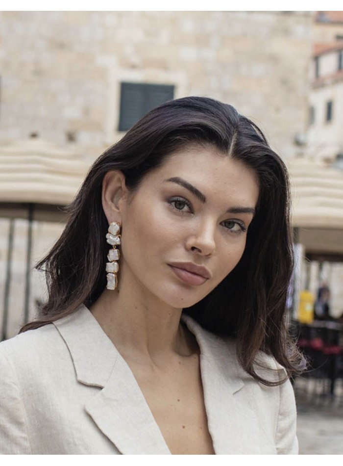 Long party earrings with natural beige stones