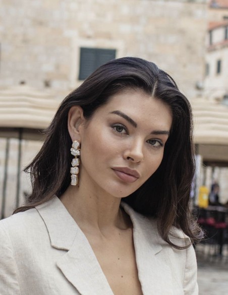 Long party earrings with natural beige stones
