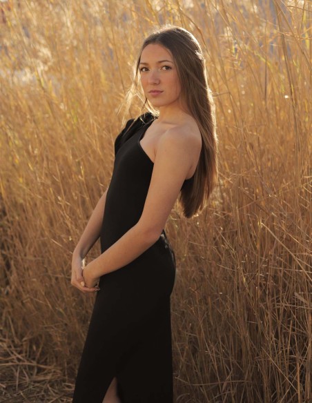 Long party dress with asymmetrical neckline and ruffles on the shoulder