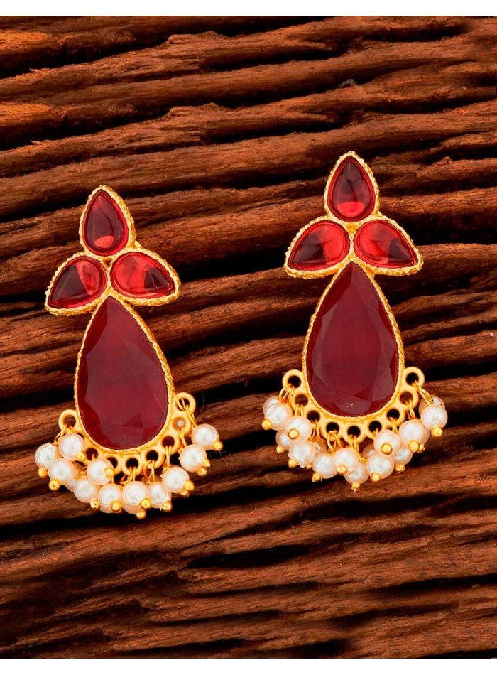 Boucle d'oreilles de fête avec des pierres naturelles et des perles