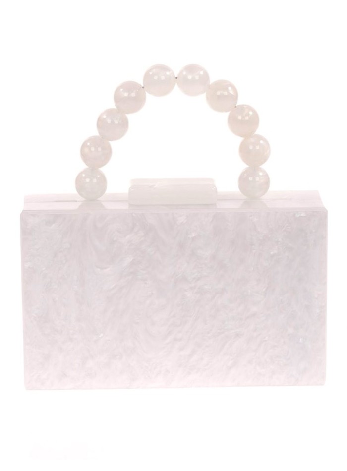 Bolso de fiesta nacarado con asa de bolitas