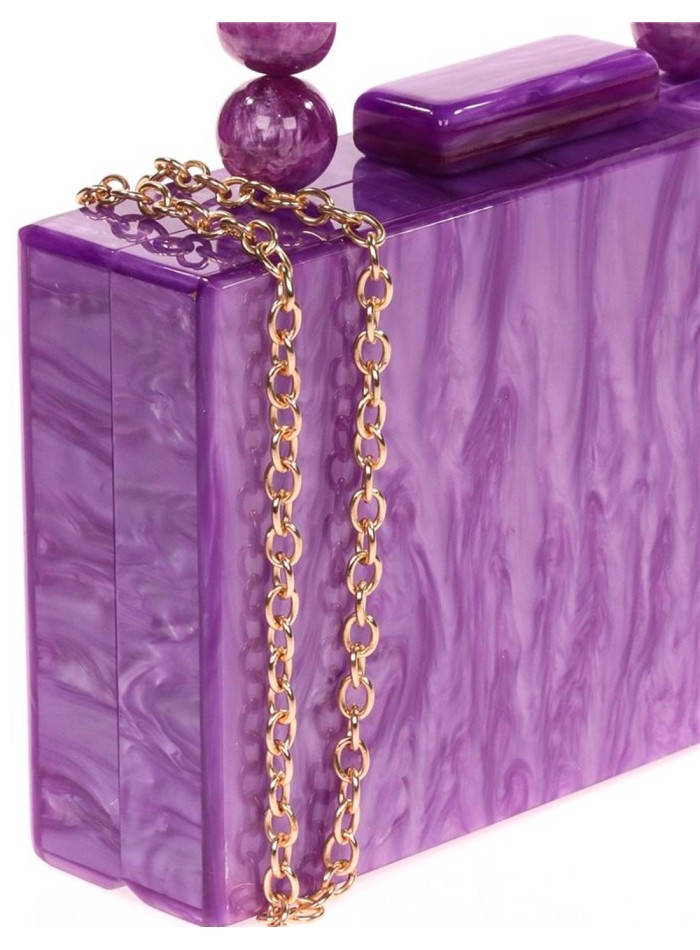 Bolso de fiesta nacarado con asa de bolitas