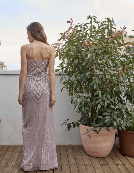 Long party dress with central opening and thin straps