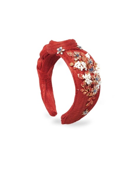 Diadema anudada con adornos joya y pistilos