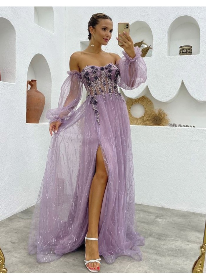 Vestido largo de fiesta con escote corazón combinado con transparencias y pedrería