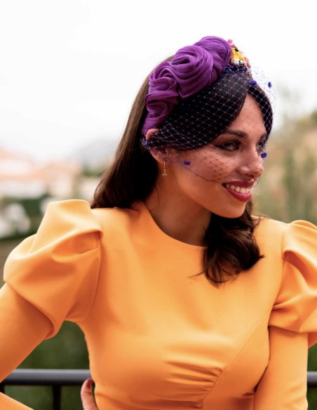 Purple knotted headband with preserved flowers