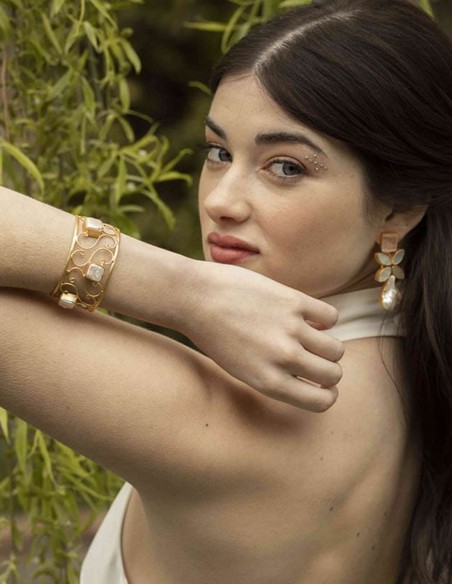 Golden bracelet with natural white stones