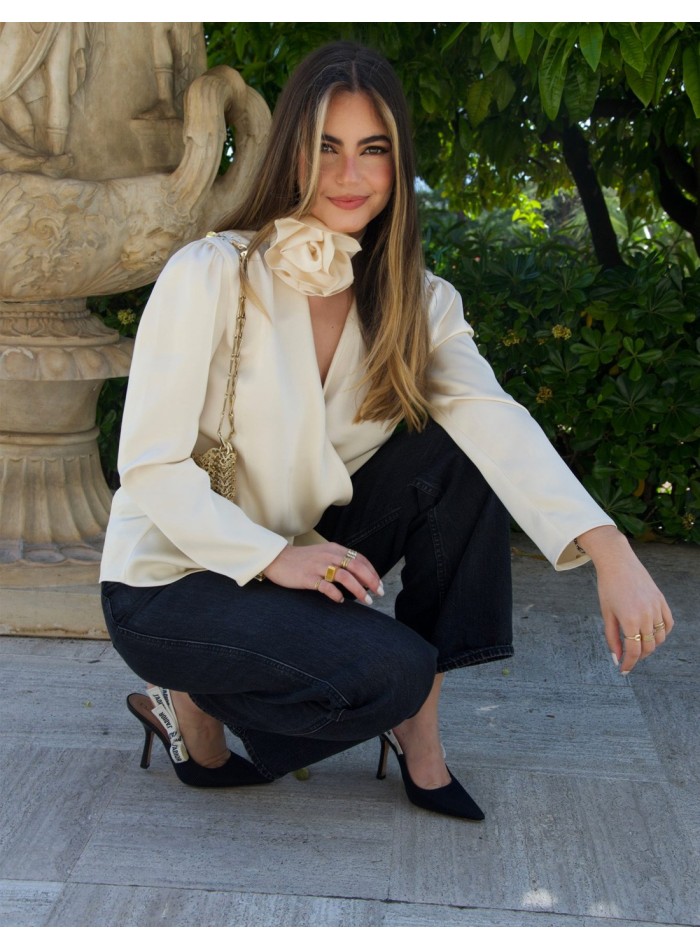 Satin party blouse with cross over design and flower on the neckline