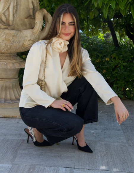 Satin party blouse with cross over design and flower on the neckline
