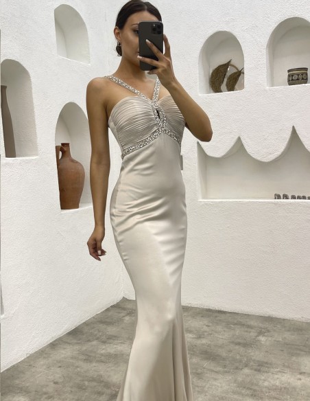 Long party dress with strapless neckline and rhinestones on the neckline