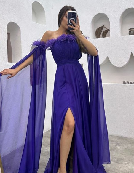 Long party dress with feather detail and cape sleeves