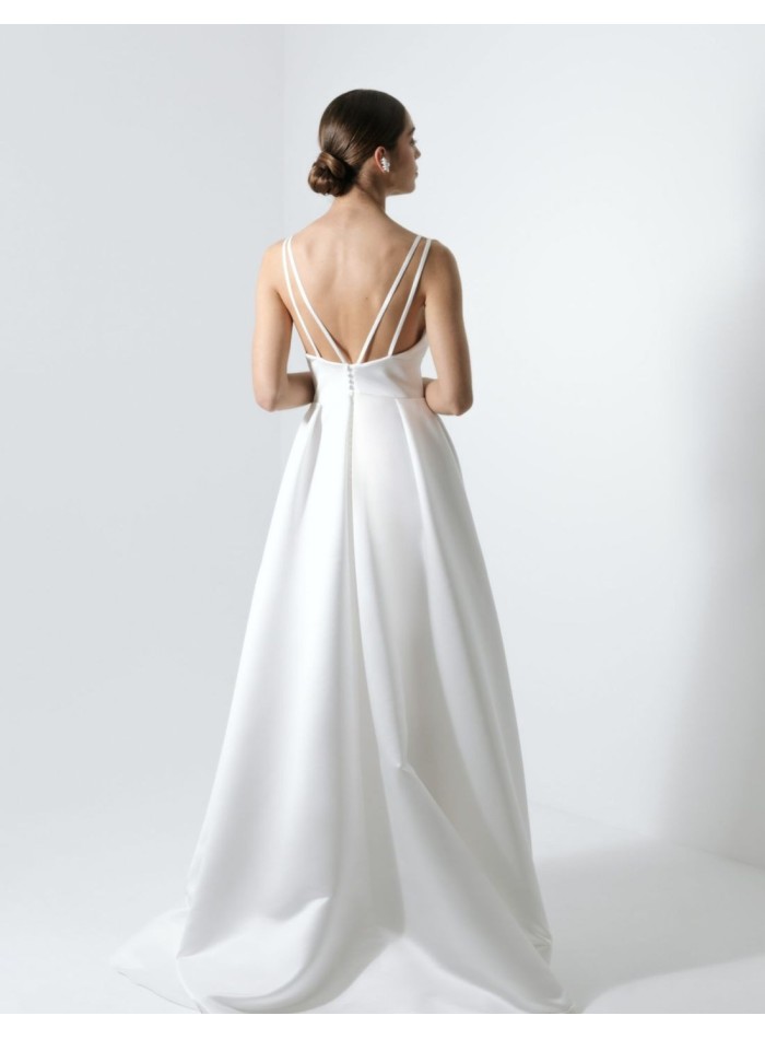 Princess-cut wedding dress with a criss-crossed...