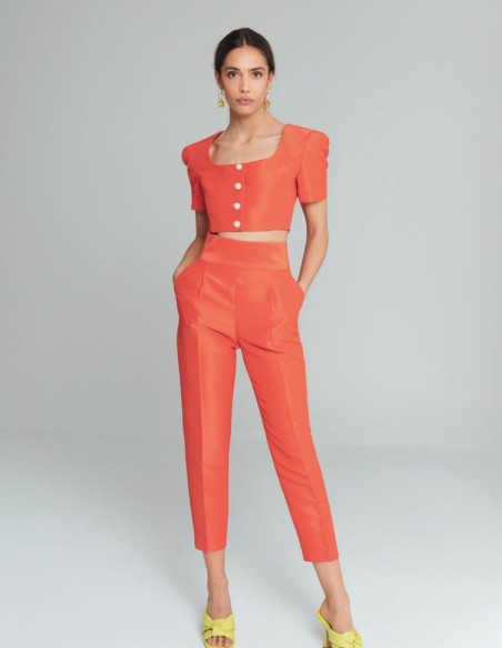Orange long trousers with darts and pockets