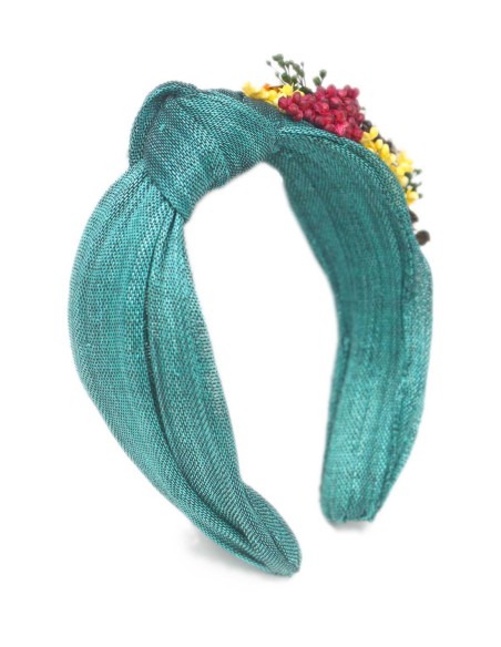 Diadema de invitada con nudo en sinamay y detalle flores