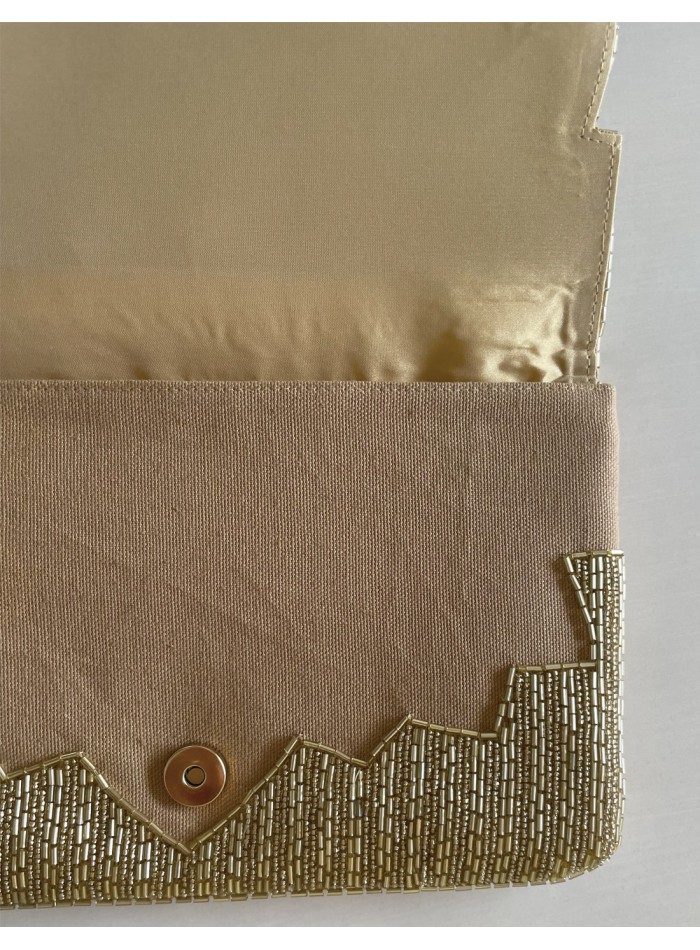 Pochette en strass doré pour les invités