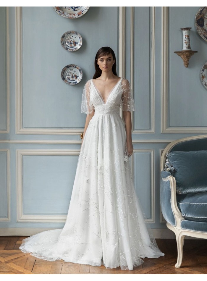 Robe de mariée avec manches courtes...
