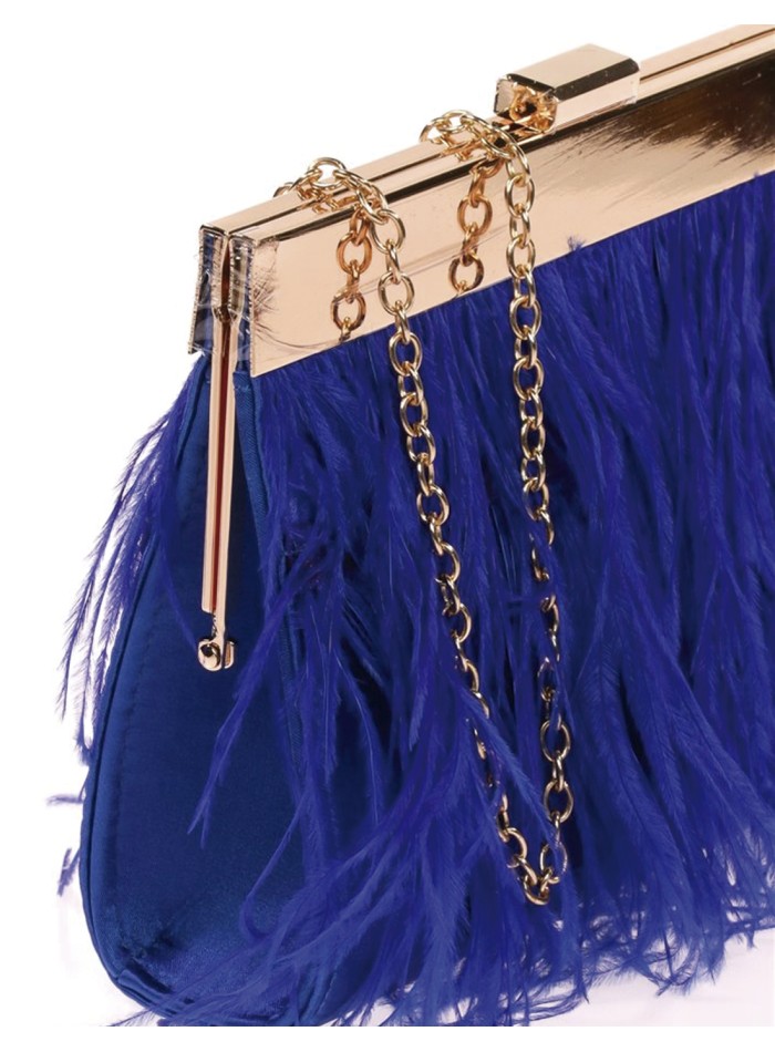 Clutch bag with fine feathers on both sides and...
