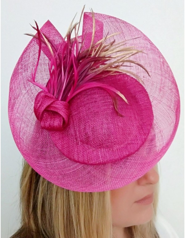 Bougainvillea raffia headdress for guests.