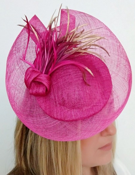 Bougainvillea raffia headdress for guests.