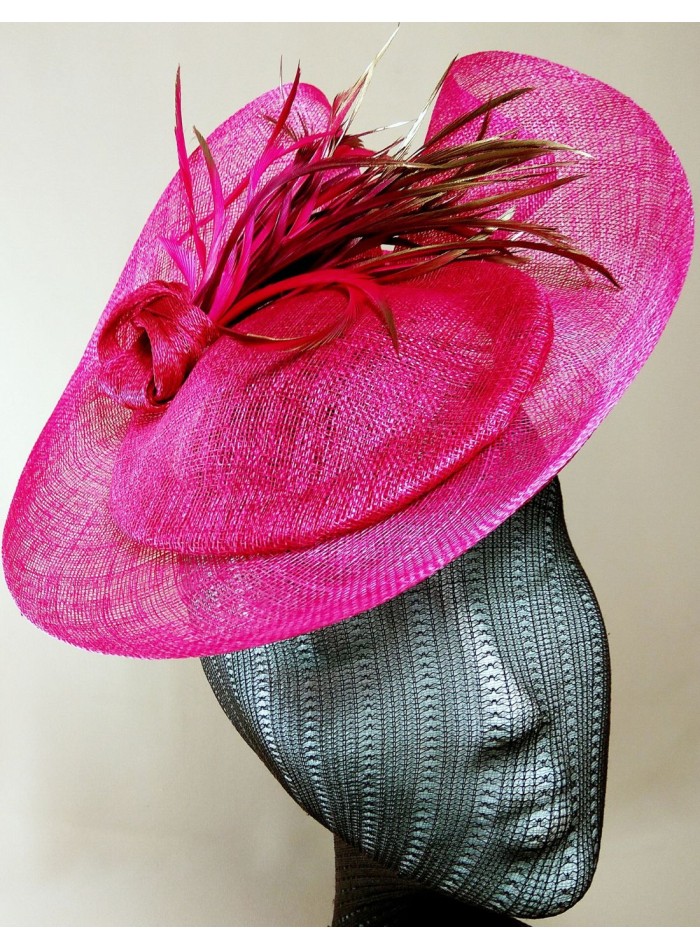 Raffia headdress with knot and goose feathers.