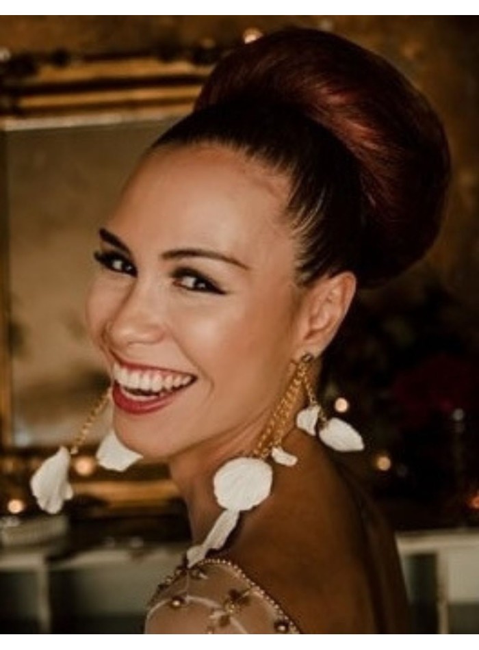 Bridal earrings with white petals dangling.