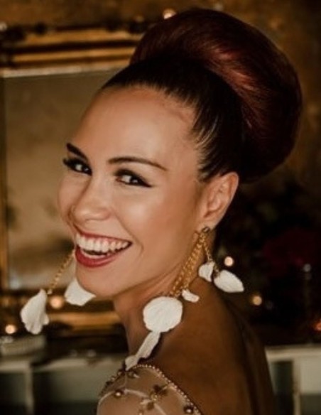 Bridal earrings with white petals dangling.