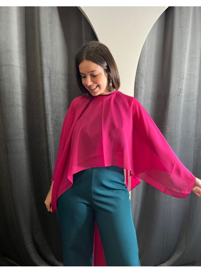 Multiposition chiffon cape in fuchsia color.