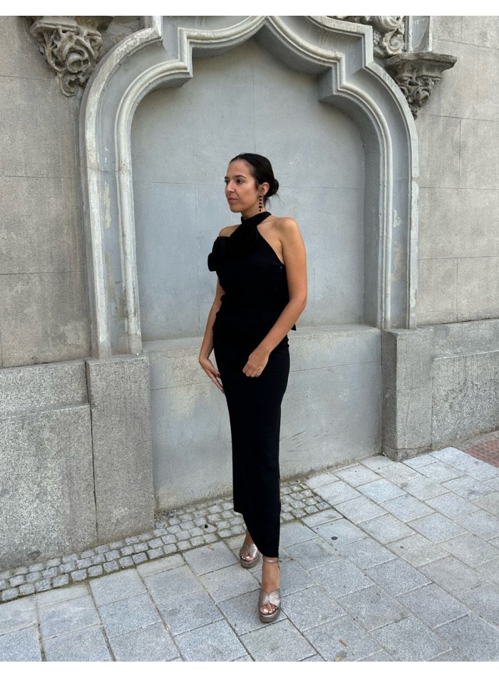 Midi party dress with halter neckline and side slit.